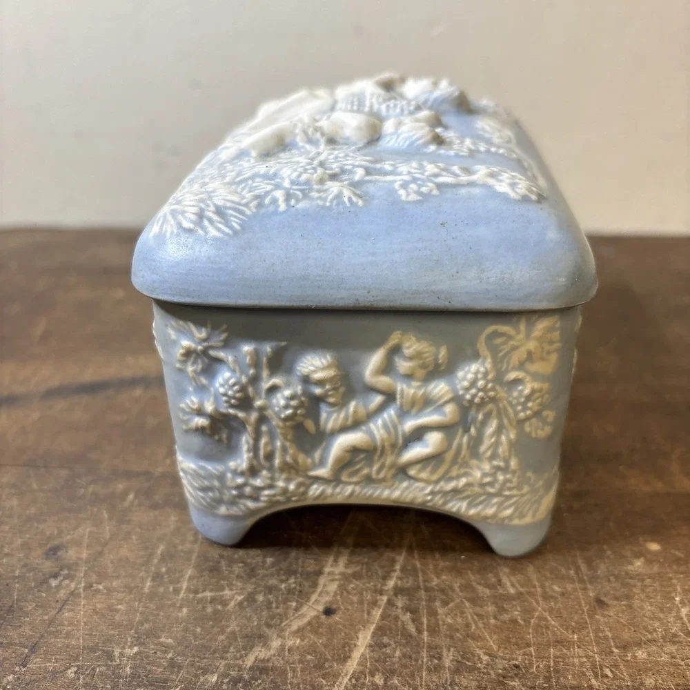 Vintage Blue & White Cherub Relief Music Box Trinket Jew Box Plays Music Footed